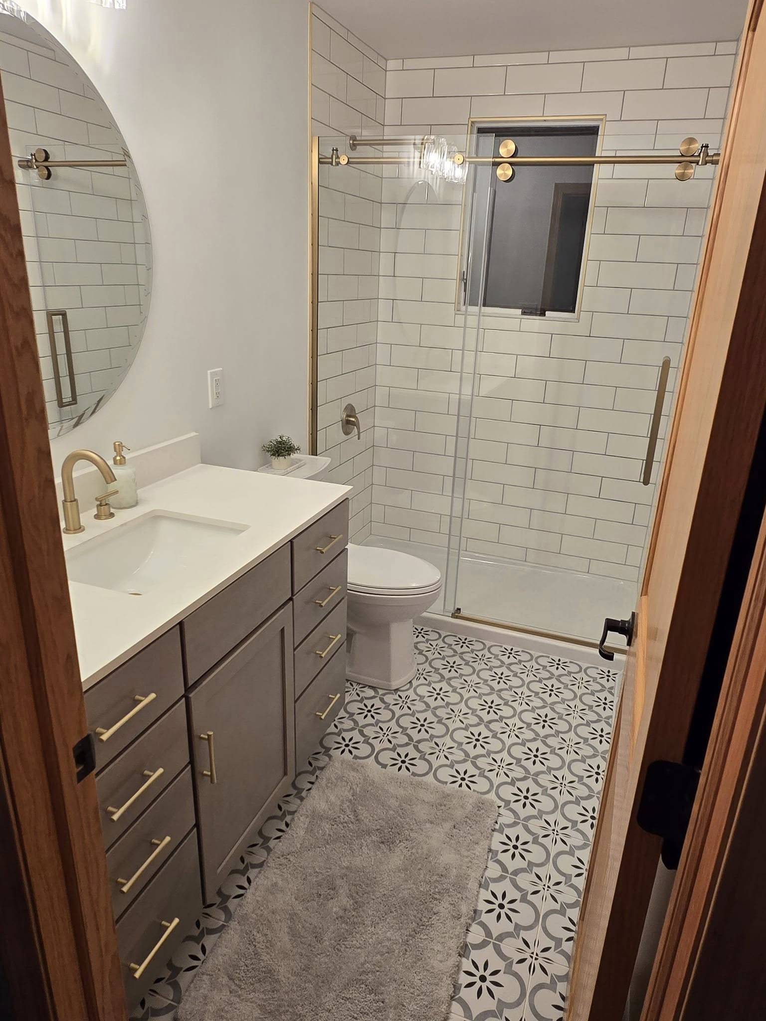 486508401_667265266239049_4770845428930357477_n A completed bathroom remodel featuring a custom tile job