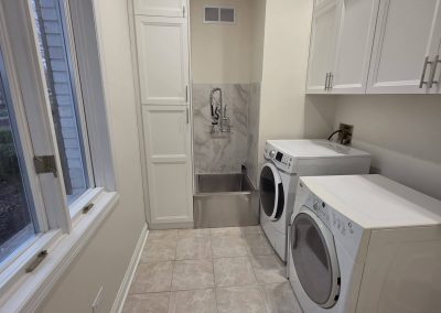 A laundry room remodel featuring LVP flooring