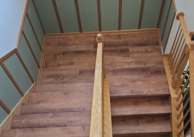 A finished stairway remodel using hardwood