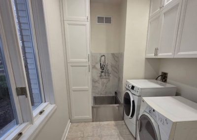 A laundry room remodel featuring LVP flooring